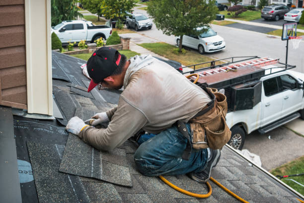 Professional Roofing technician working in Nada, TX